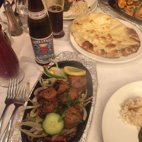 Ajanta signature dishes Tandoori ChickenLamb Rib ChopsSeasonal Fish Curry